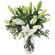 arrangement of lilies with greenery