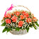 basket of coral roses with babys breath. Saudi Arabia